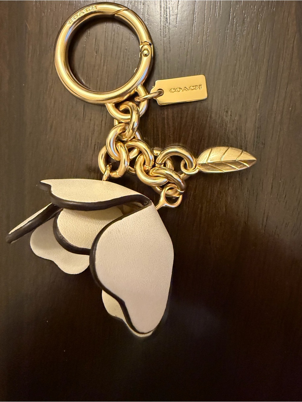 Coach Gold Tone Keyring with Cream Leather Flower